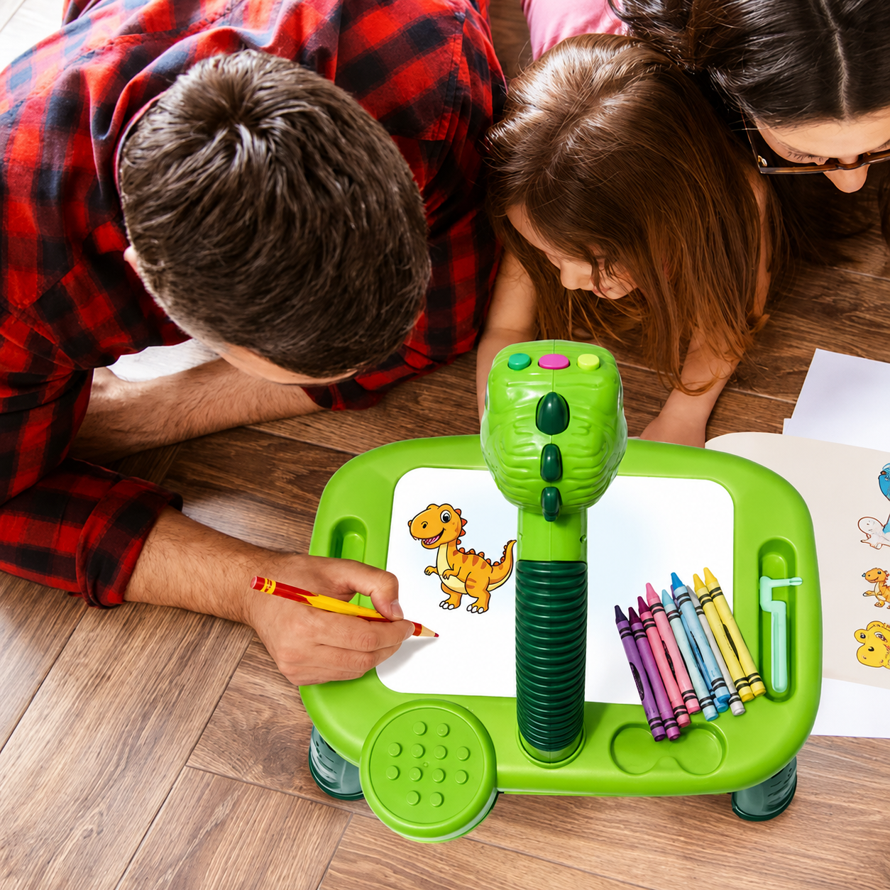 A child happily drawing with the DoodleStar projector